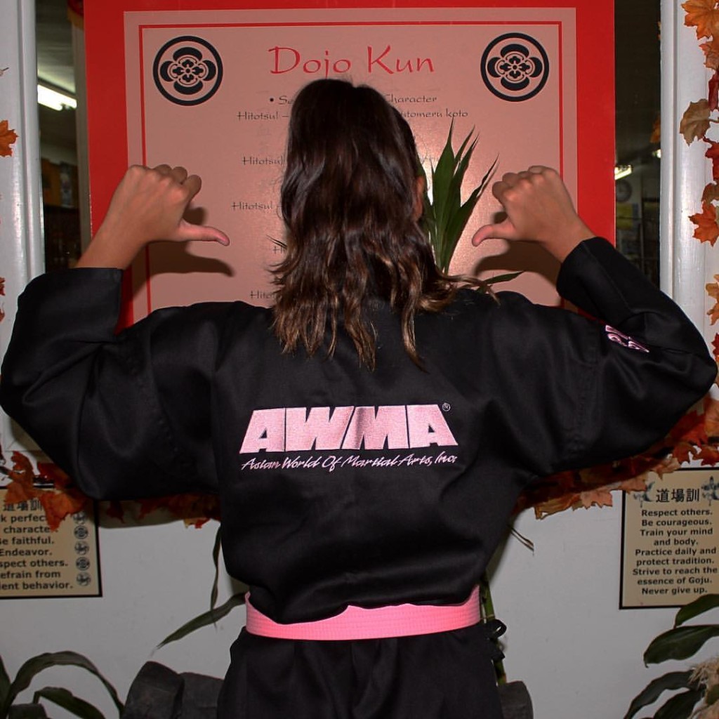 AWMA Team Member Destiny Vergara in her ProForce gi with pink detail and pink belt.  Photo courtesy of Destiny and Gerald Vergara