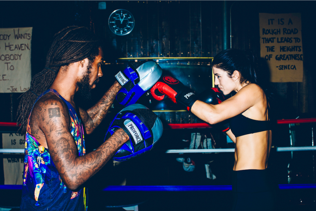 Gift Davis (left) training with a pair of his go-to ProForce focus gloves